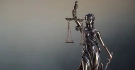 The Statue of Justice or lady justice. The photo is from AdobeStock/Aerial Mike.