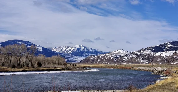 Lake in front of snow-covered mountains