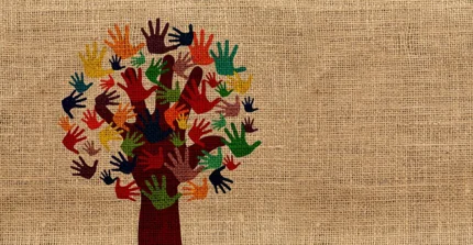 Tree crown formed from colorful hand prints