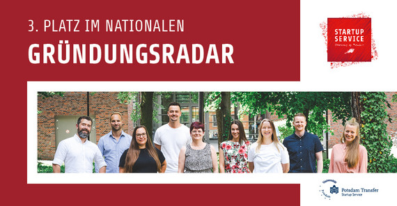 Several people stand together as a group.